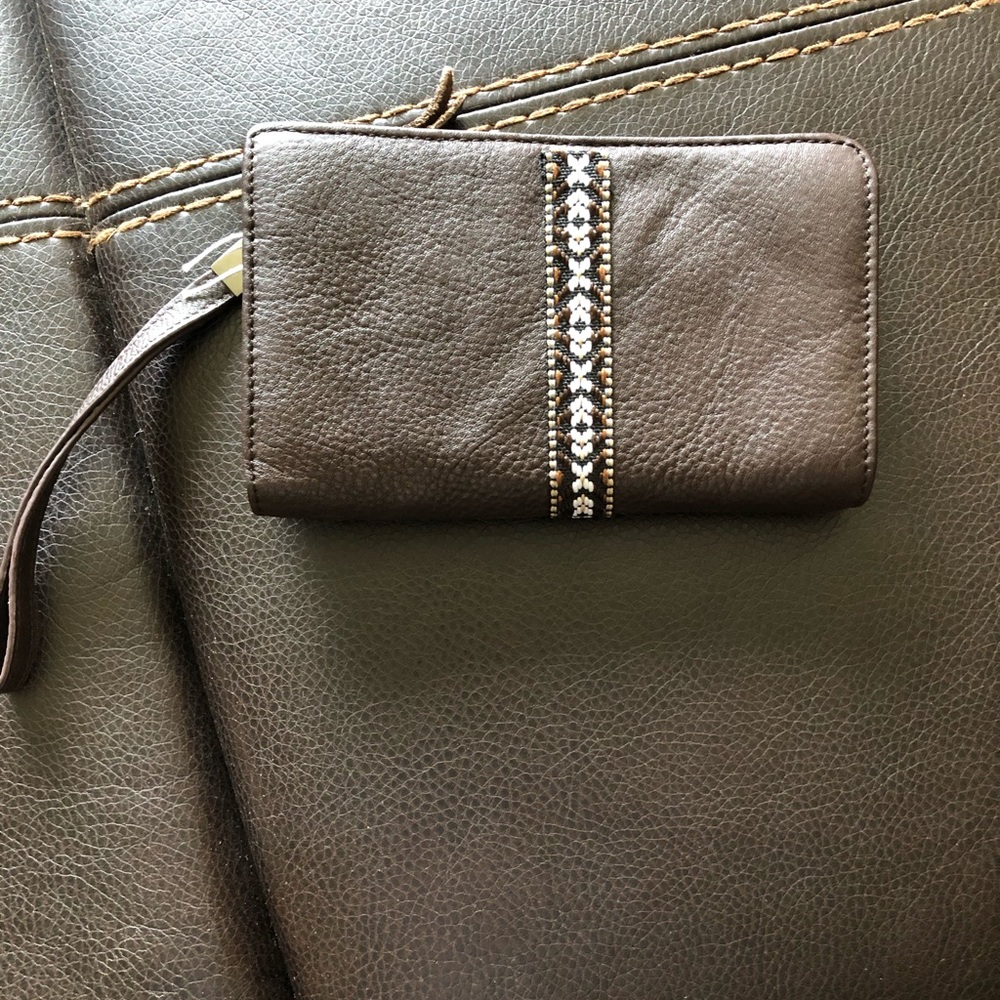 Leather wristlet by Annette Ferber